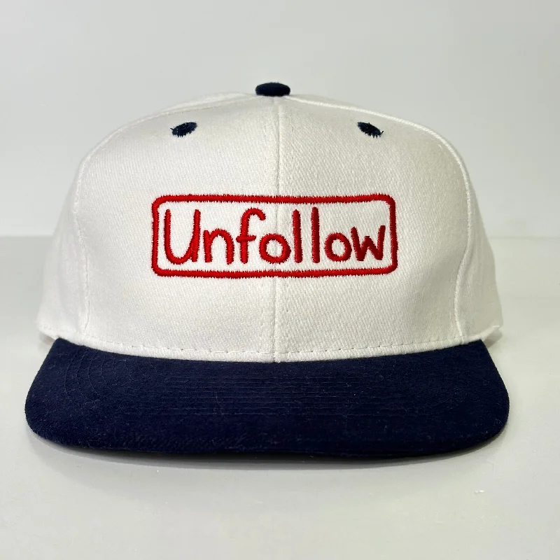 Beanies & headbands for snug fits-Unfollow on a white and navy Strapback hat cap Custom Embroidery