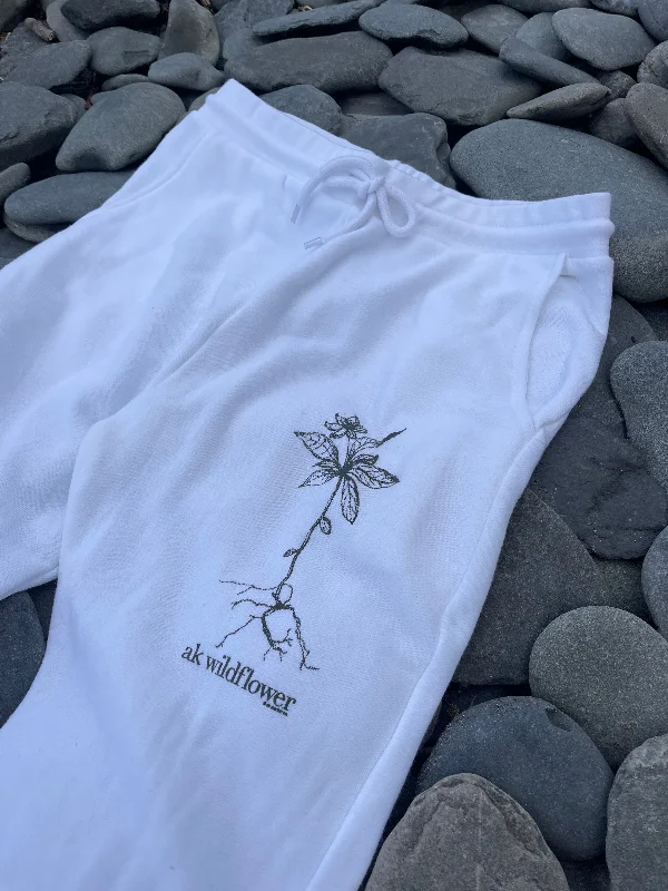 Beanies & headbands for chill Fridays-White 50/50 AK Wildflower Joggers. $68.00